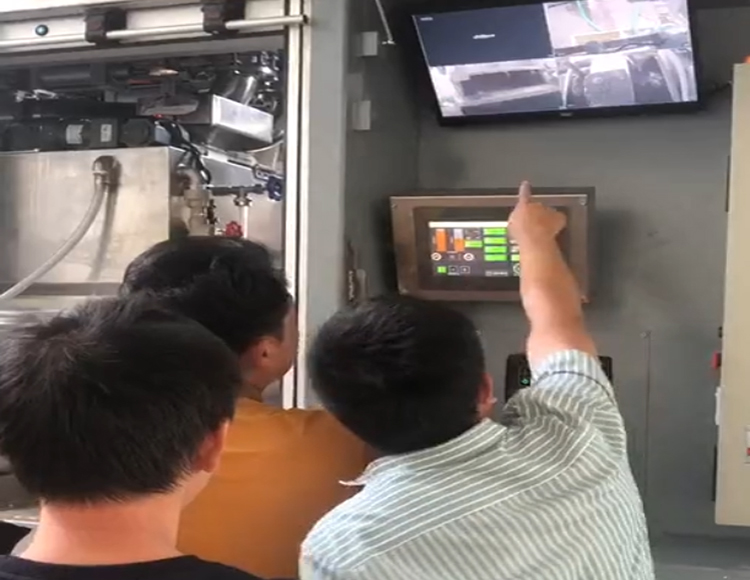 達成工程師現場試車培訓客戶使用“清杺牌”